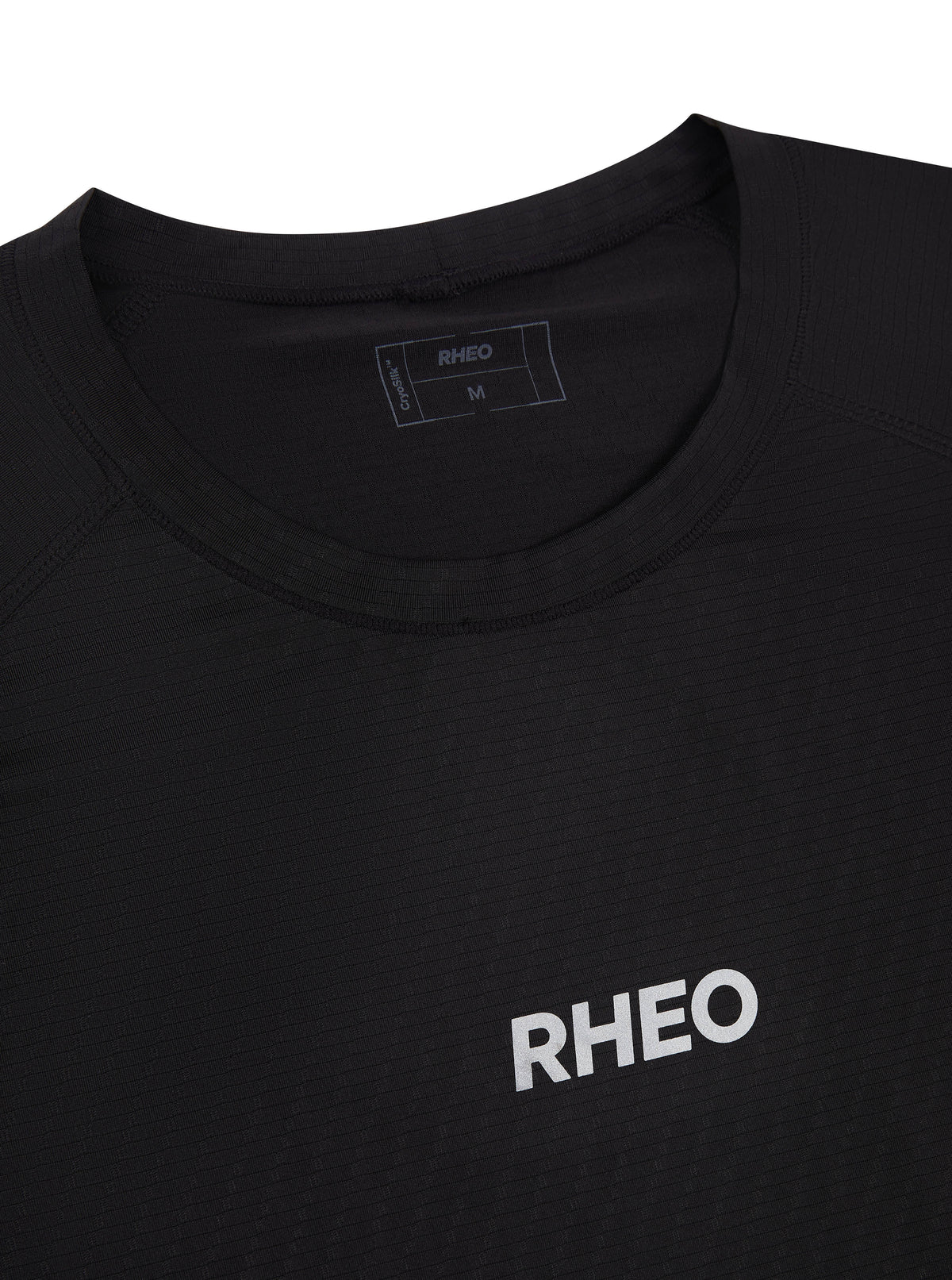 Close-up of the black RHEO CryoSilk™ T-Shirt fabric, chest logo and neckline for men's padel.